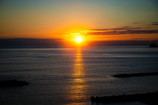 黄昏海平面落日余晖夕阳摄影图片