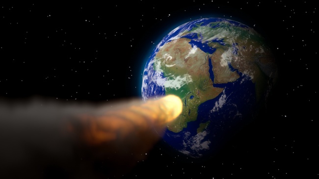 小行星飞掠地球图片