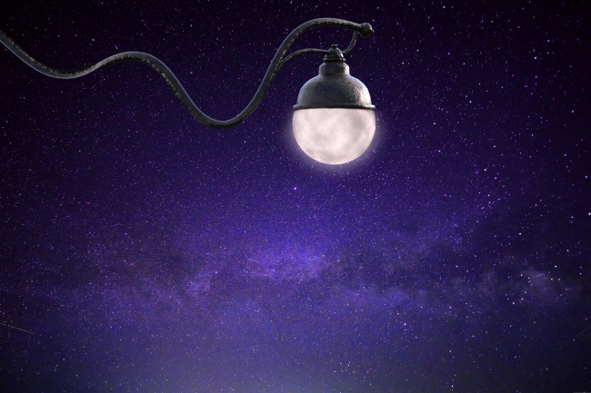 唯美紫色星空灯光图片